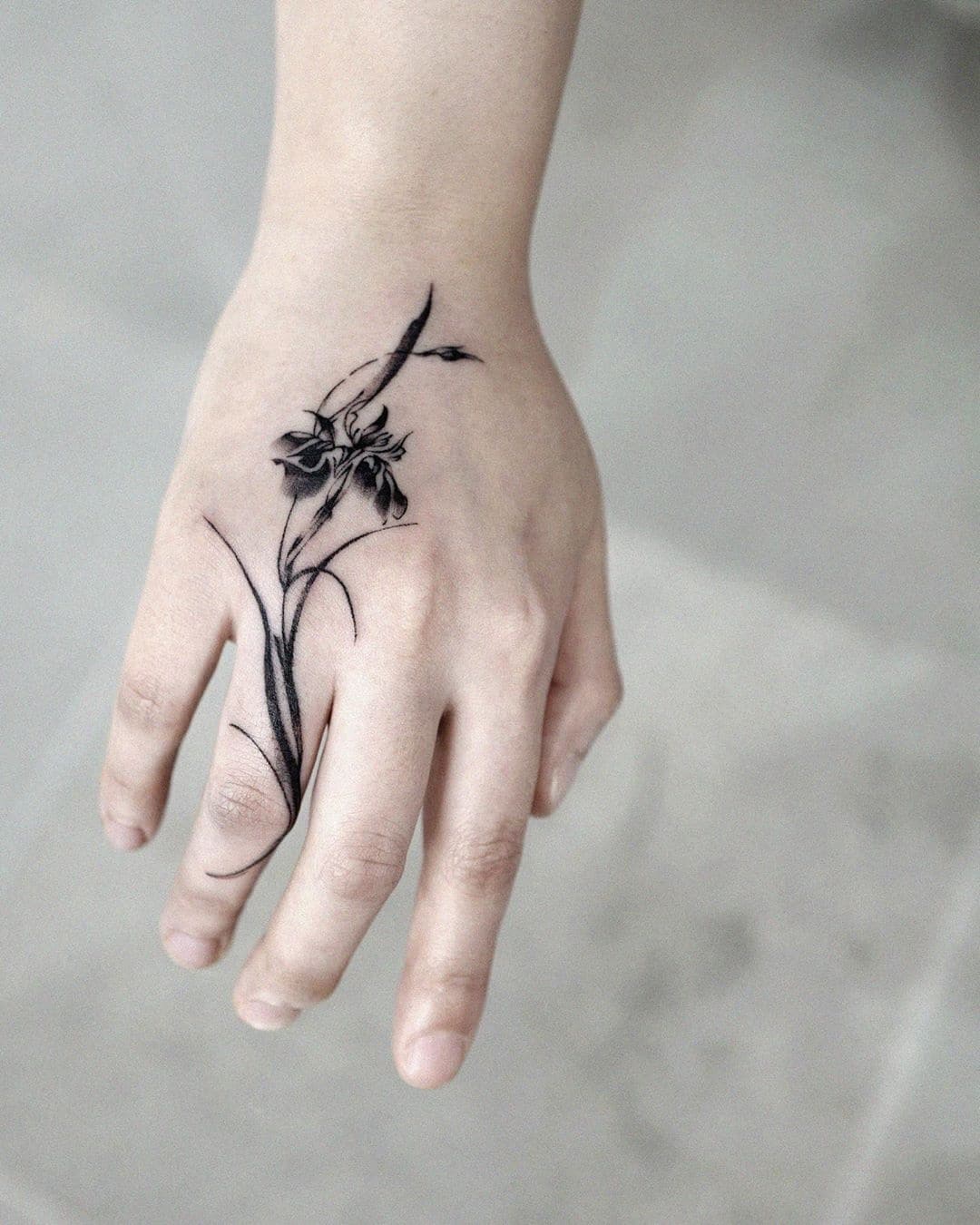 Iris tattoos: 10 Best Designs and Meanings